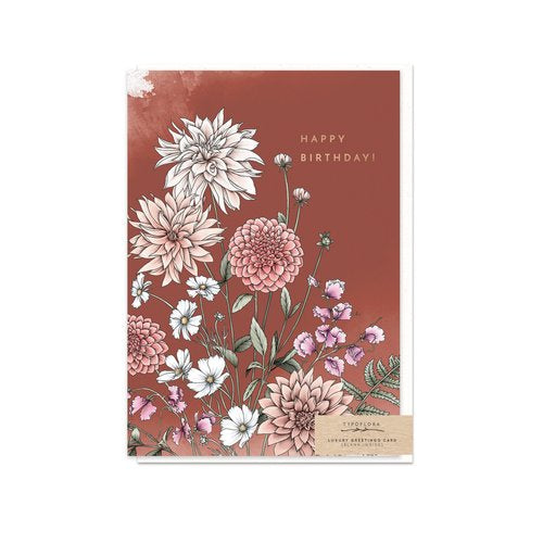 Typoflora birthday card with dahlias against a rusty red colour on the front