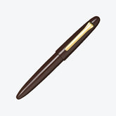 Sailor 1911 King of Pens fountain pen with dark brown urushi lacquer finish, capped