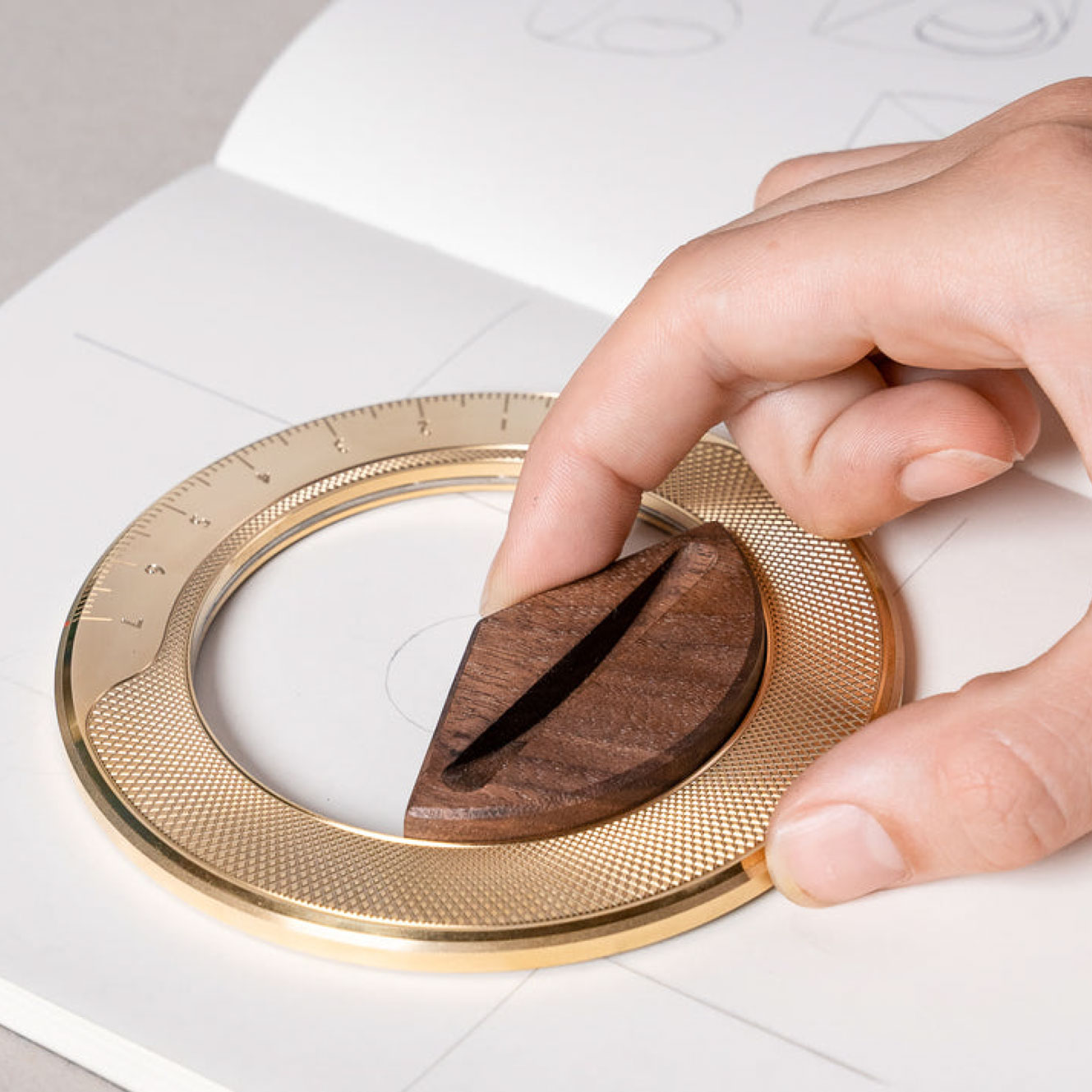Detail of the Makers Cabinet Iris compass aperture that sets the circle radius